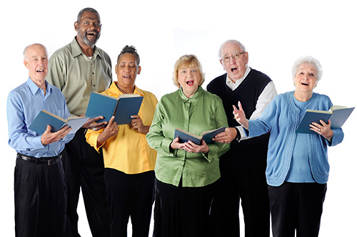 men and women singing in a choir