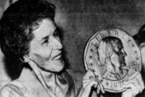 picture of Susan B. Anthony II holding a photo of the Susan B. Anthony coin