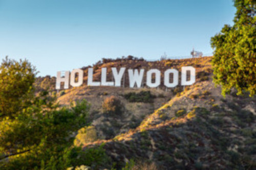 famous hollywood sign. letters spelling hollywood along a mountainside