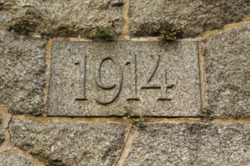 stone brick with 1914 etched in it.