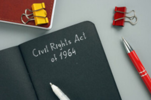 Photo of a book with writing that says Civil Rights Act of 1964