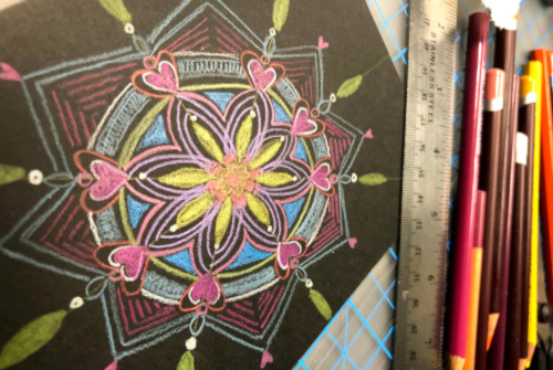 Mandala drawing using varied colored pencil colors