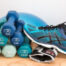 Picture of sneakers, hand weights and exercise ball