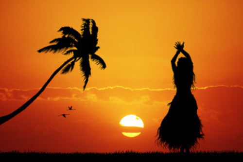 hula500 Silhouette of a hulu dancer set against of sunset over the ocean.