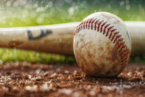 baseball dirty baseball and bat lying on the ground