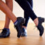 picture of the feet of two tap dancers with tap shoes on