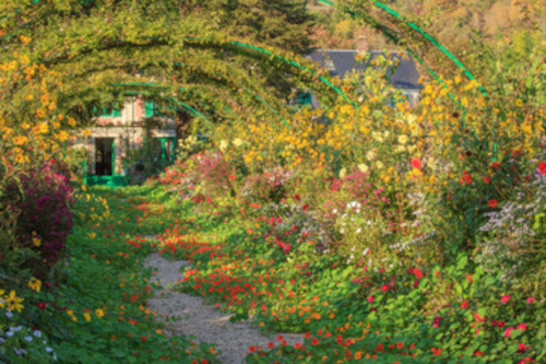 Painting in the style of monet. A walkway with flowers, trellises and a building at the end of the walkway