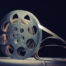 Picture of a movie reel with a movie strip
